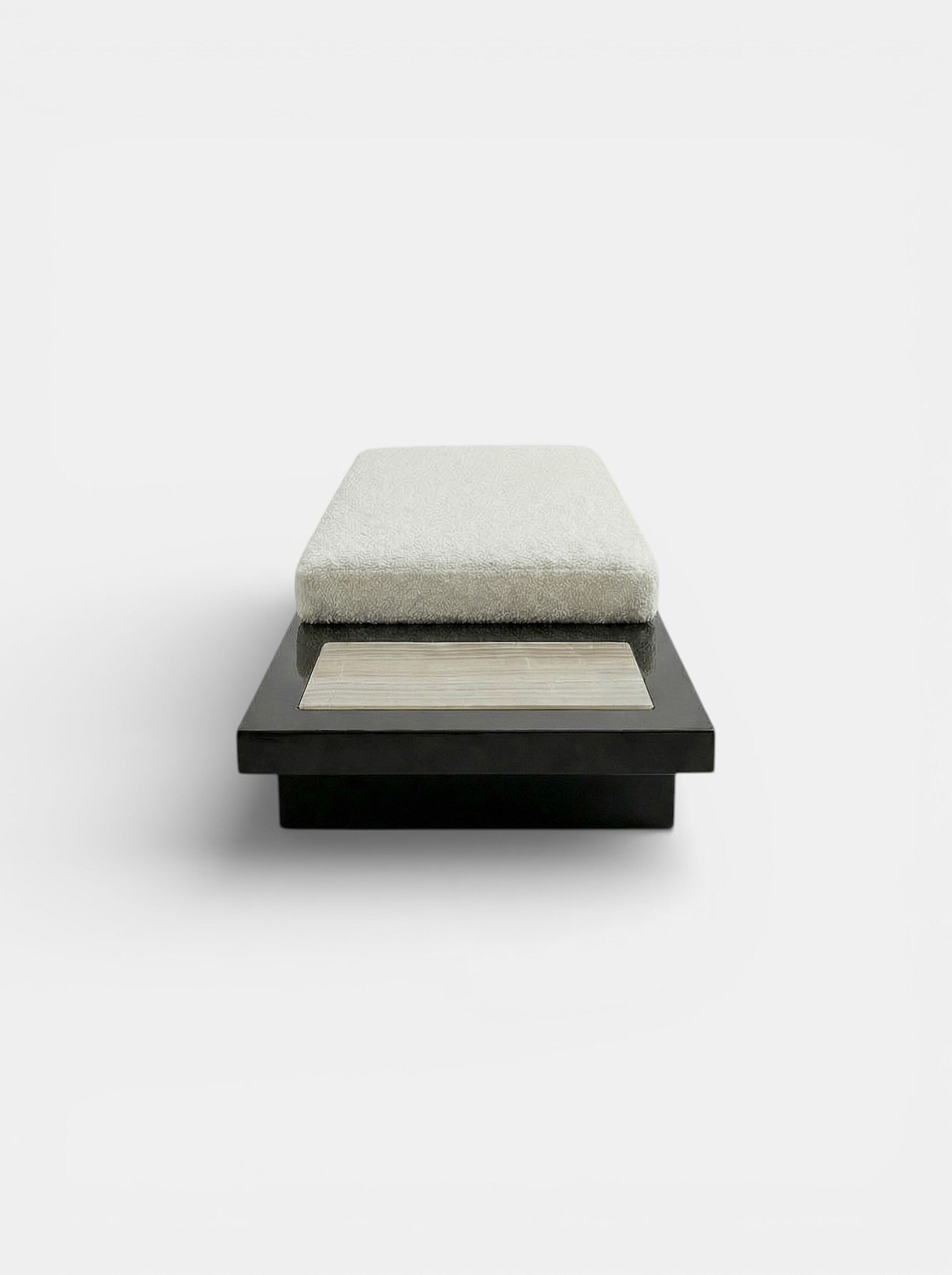 Detail angle of Sybille black ivory onyx bench revealing natural stone patterns and expert craftsmanship
