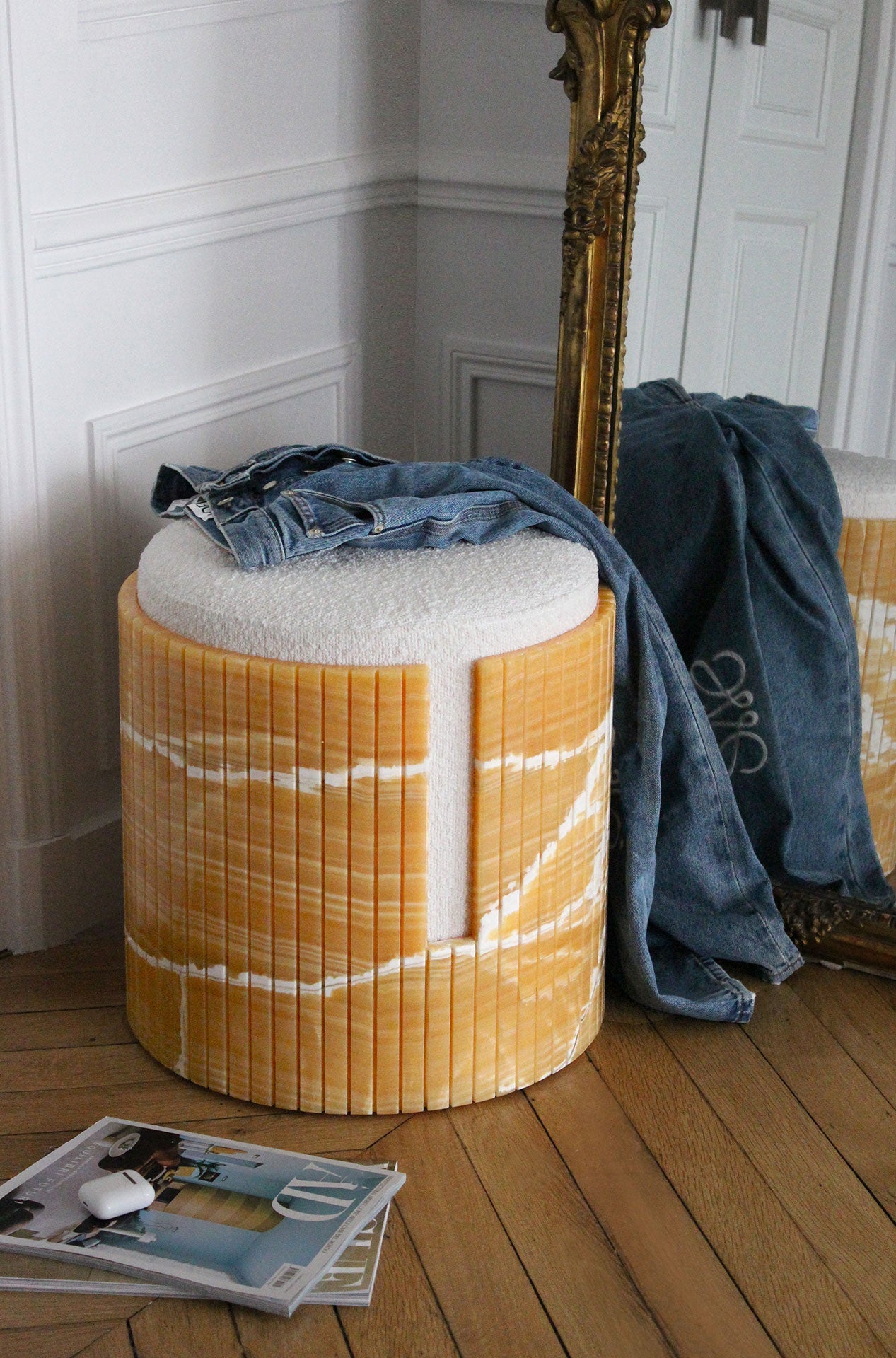 Mango Onyx marble stool side view showing natural veining patterns and sculptural form