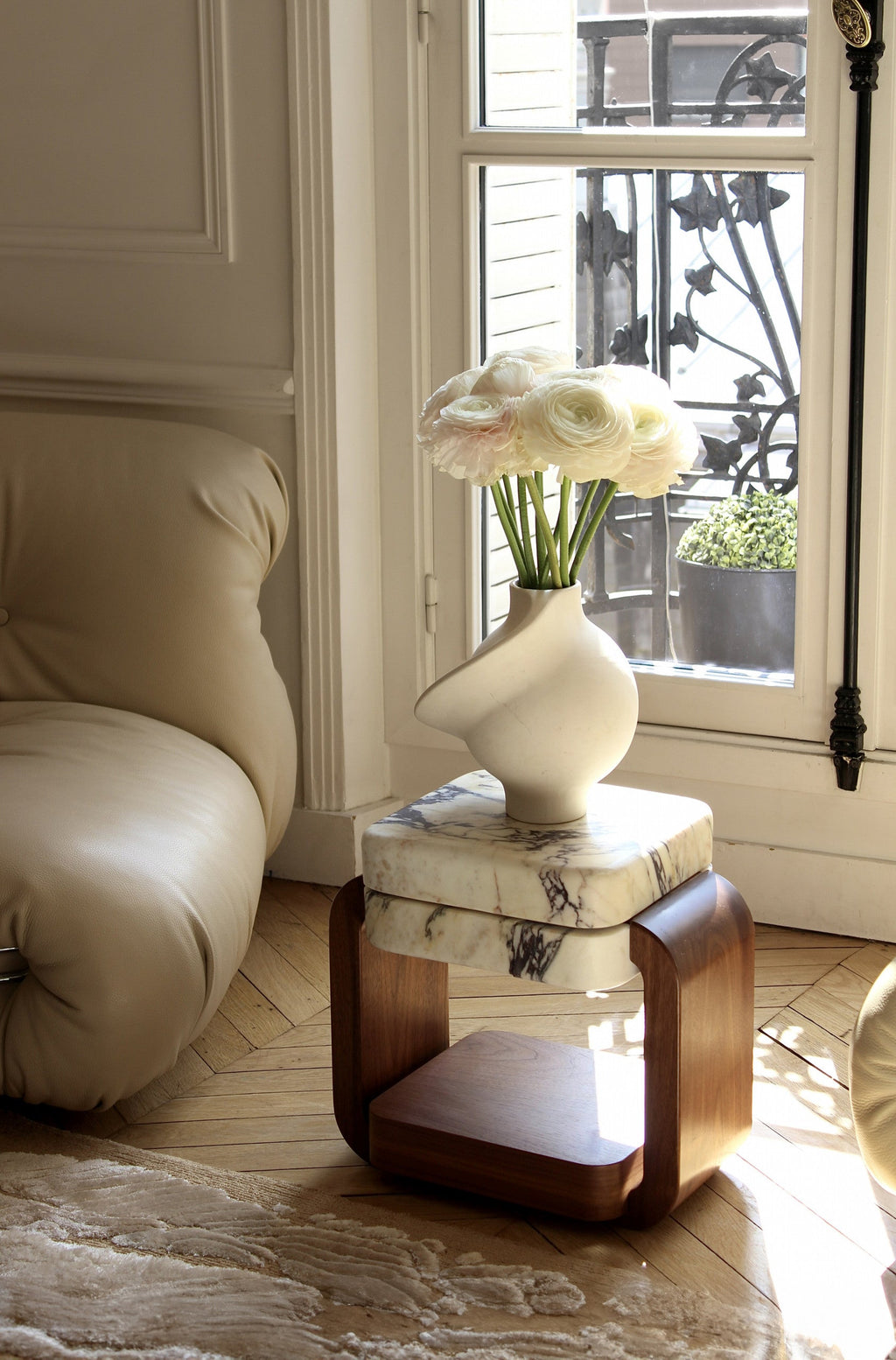 Tori Italian marble table showing elegant curved base design - luxury white marble dining furniture