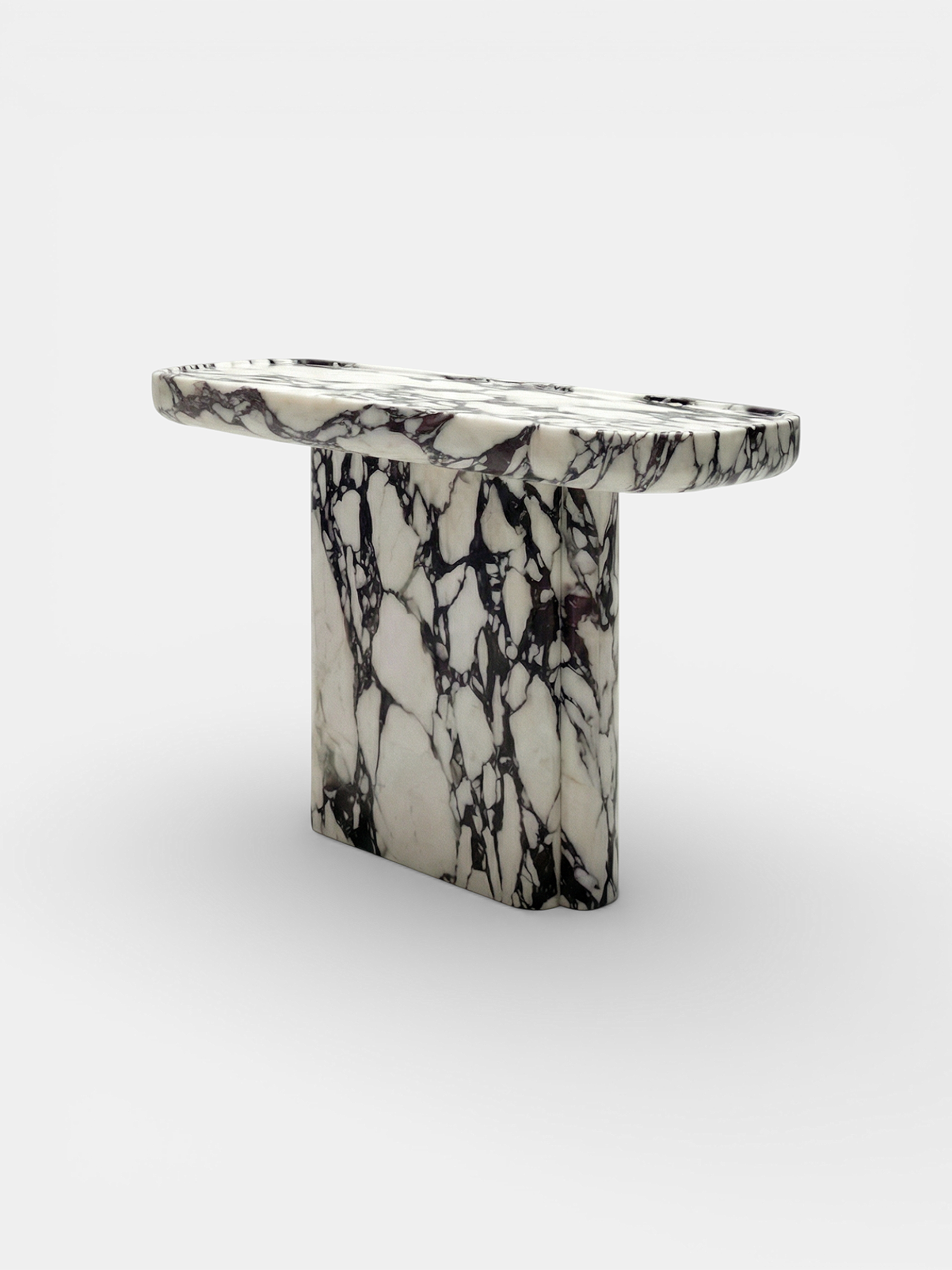 Ugo console detail showing Calacatta Viola marble patterns - premium Italian stone furniture craftsmanship