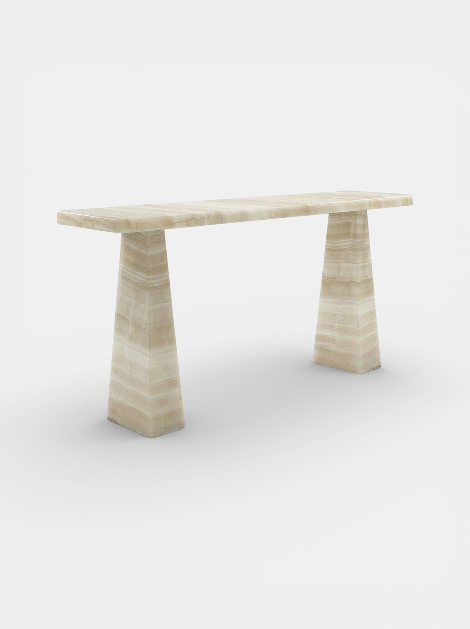 Uma Ivory Onyx console showcasing translucent cream stone patterns and premium Italian craftsmanship