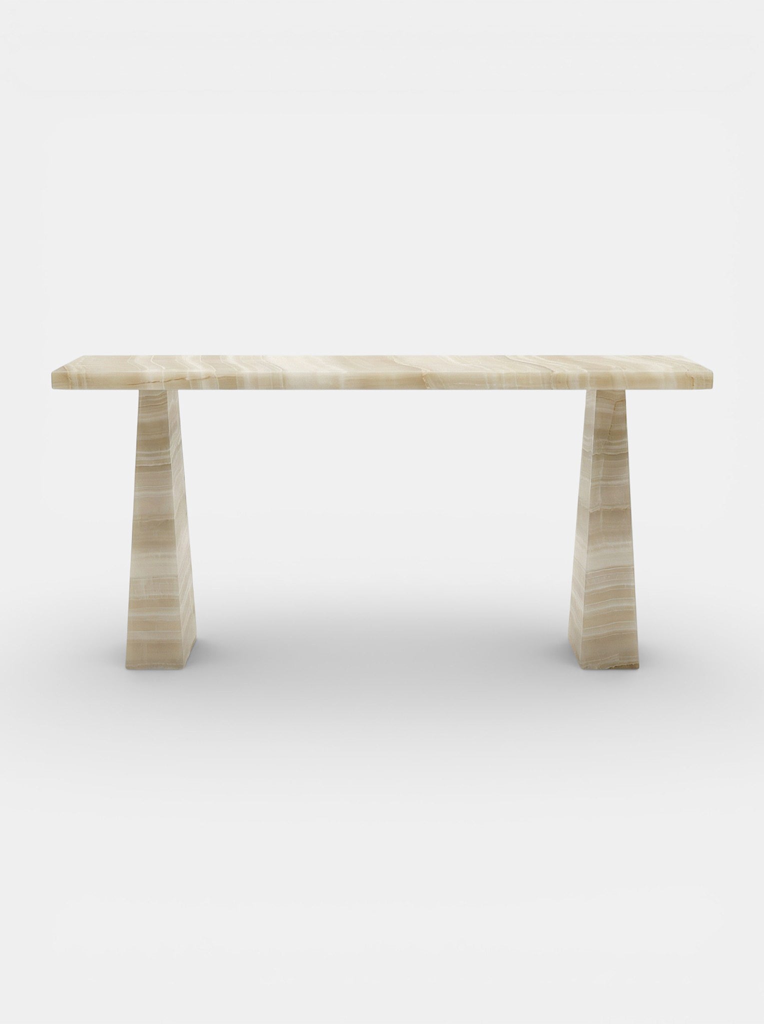 Uma console crafted from Ivory Onyx marble featuring creamy white tones and Italian luxury design