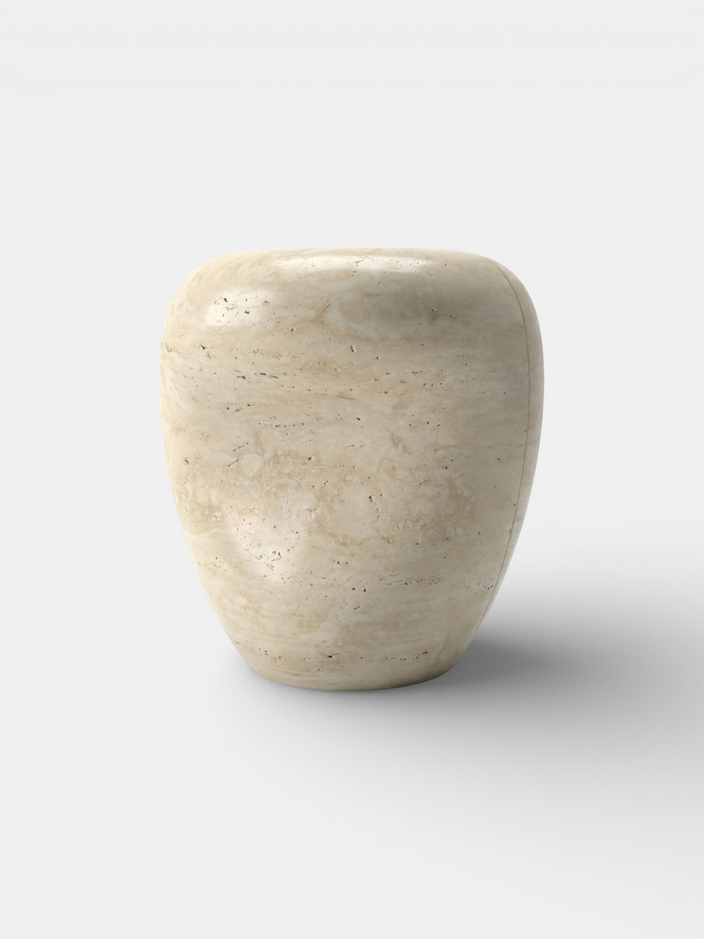 Natural travertine side table detail view showing beautiful stone texture and craftsmanship
