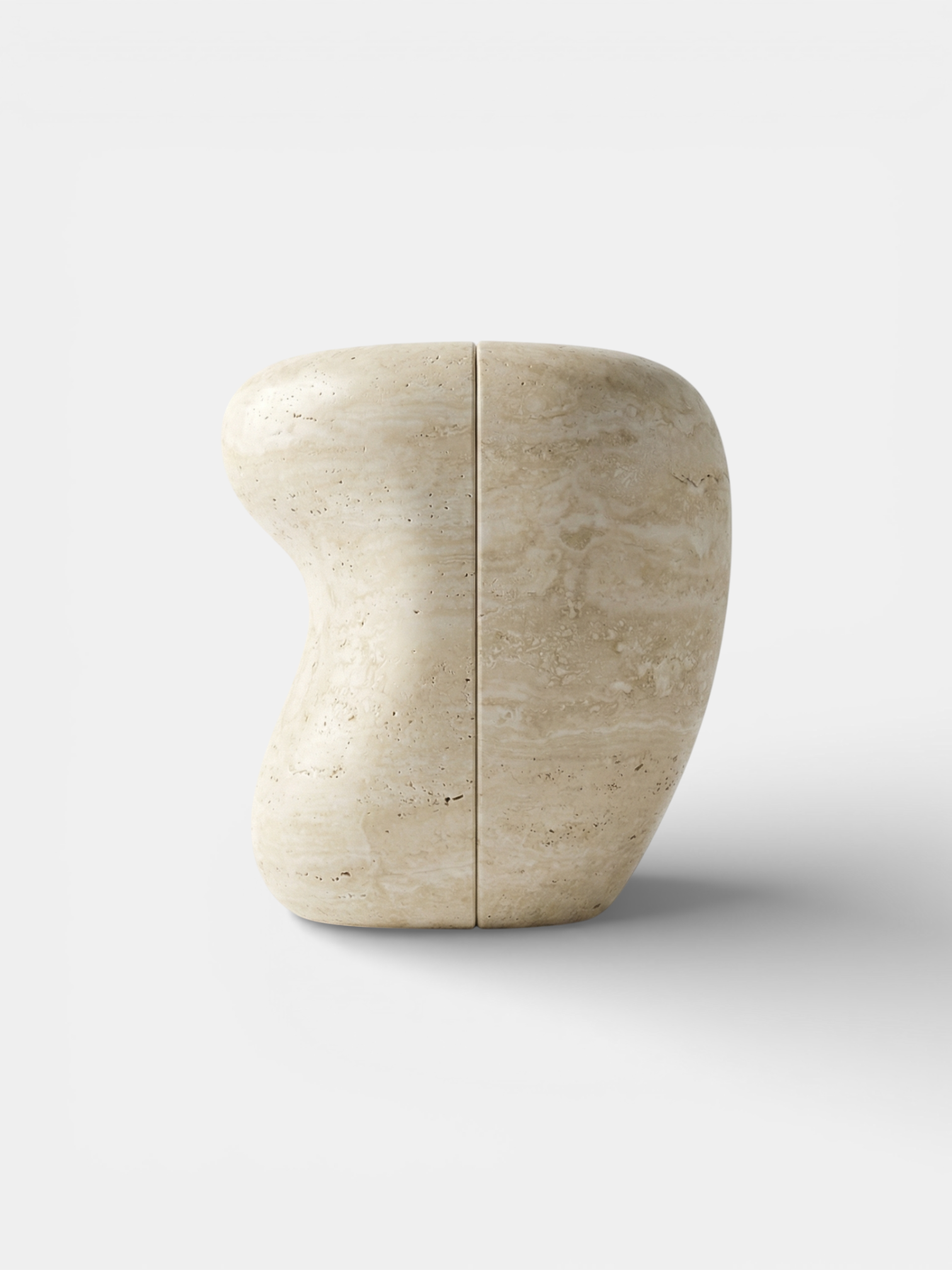 Luxury Italian travertine side table with modern sculptural design - MARBERA Yosho collection